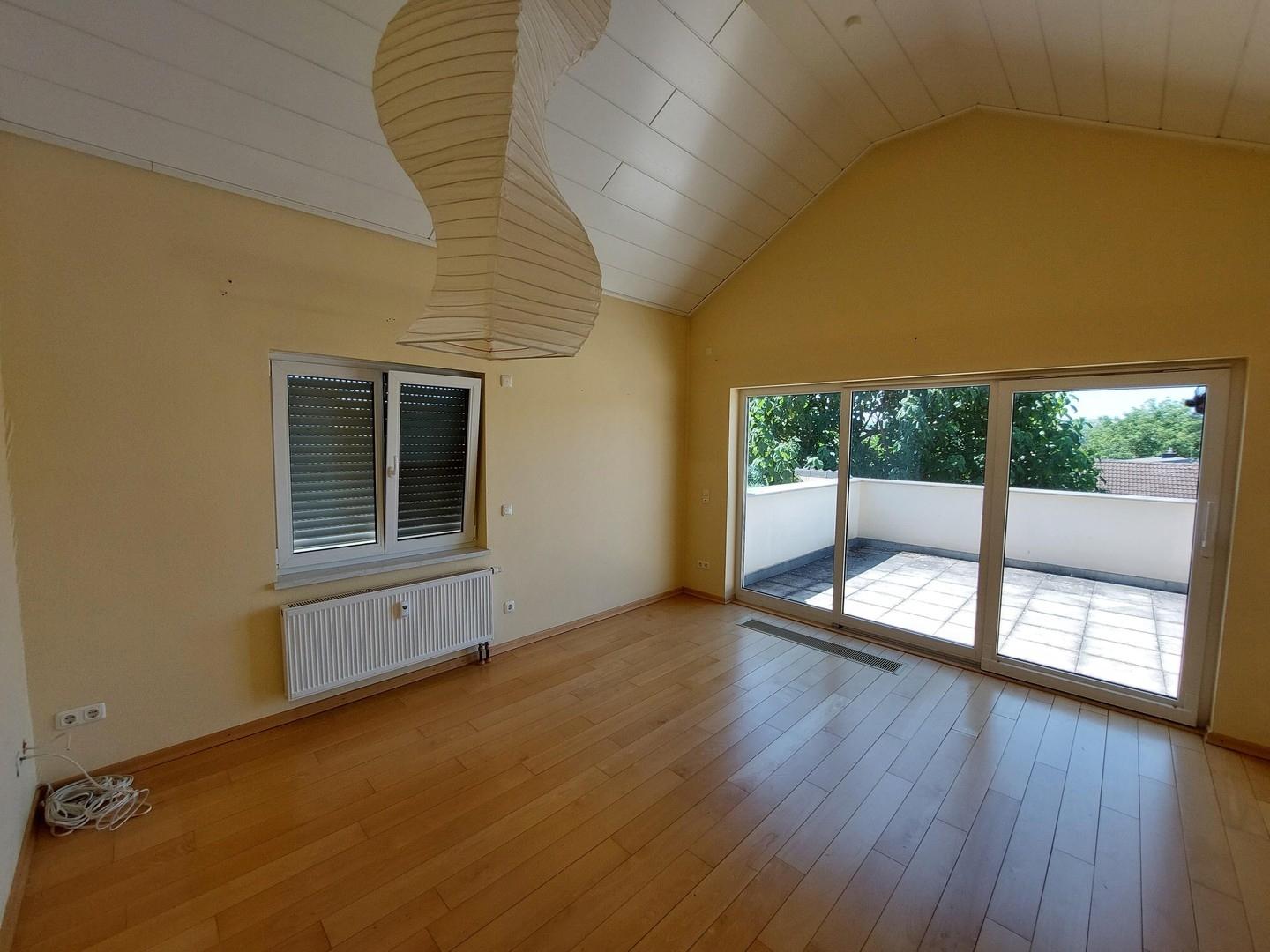 Wohnzimmer mit Dachterrasse