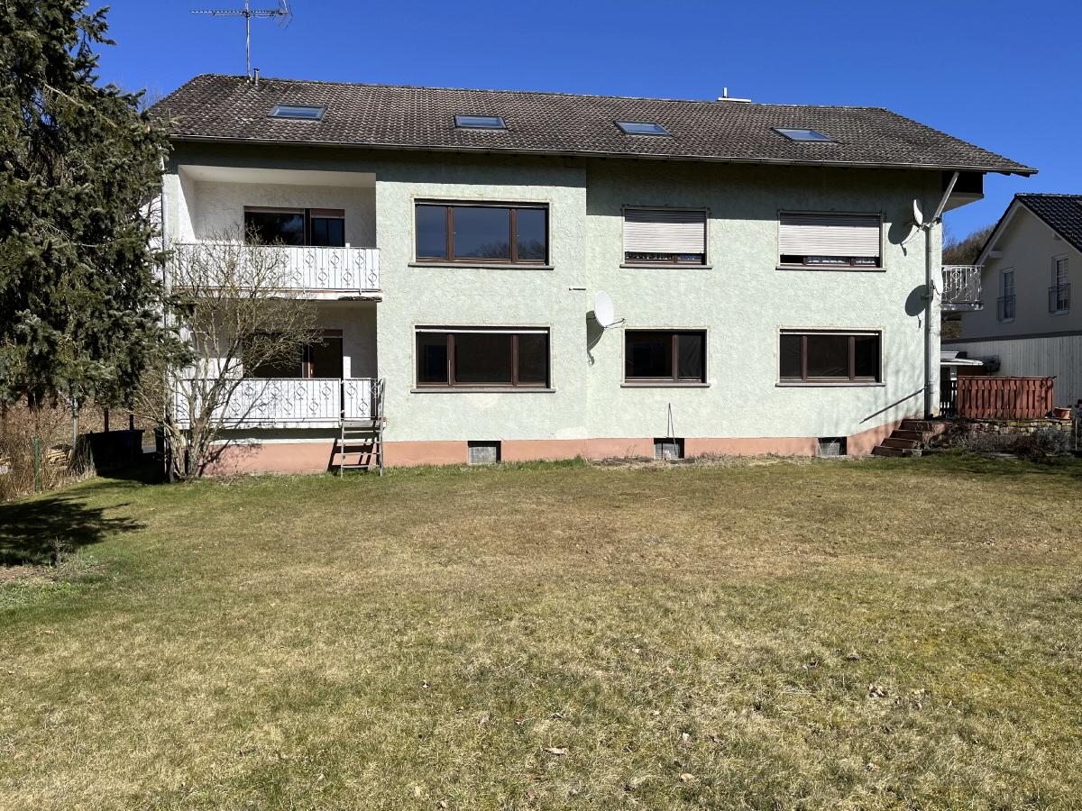 Mehrfamilienhaus mit Garten