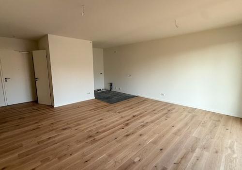 Wohn- und Esszimmer mit offener Küche