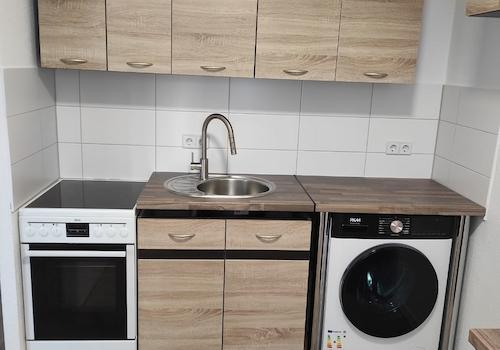 Küchenzeile mit WM und Herd