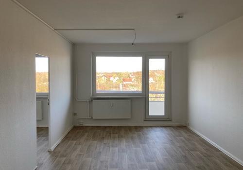 Wohnzimmer mit Balkon