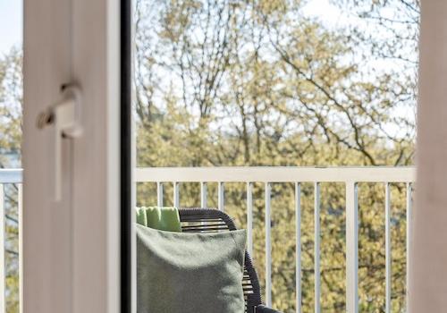 Schlafzimmer mit Balkonzugang