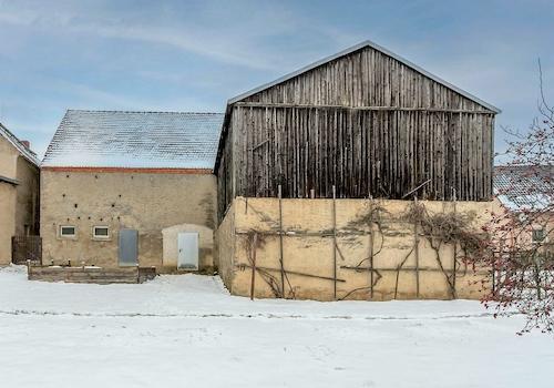 Hintere Hausansicht mit Scheunenanbau