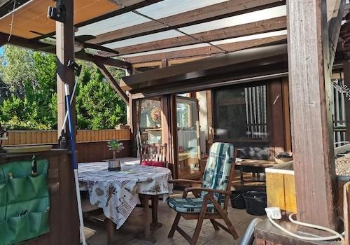 Terrasse mit Wintergarten