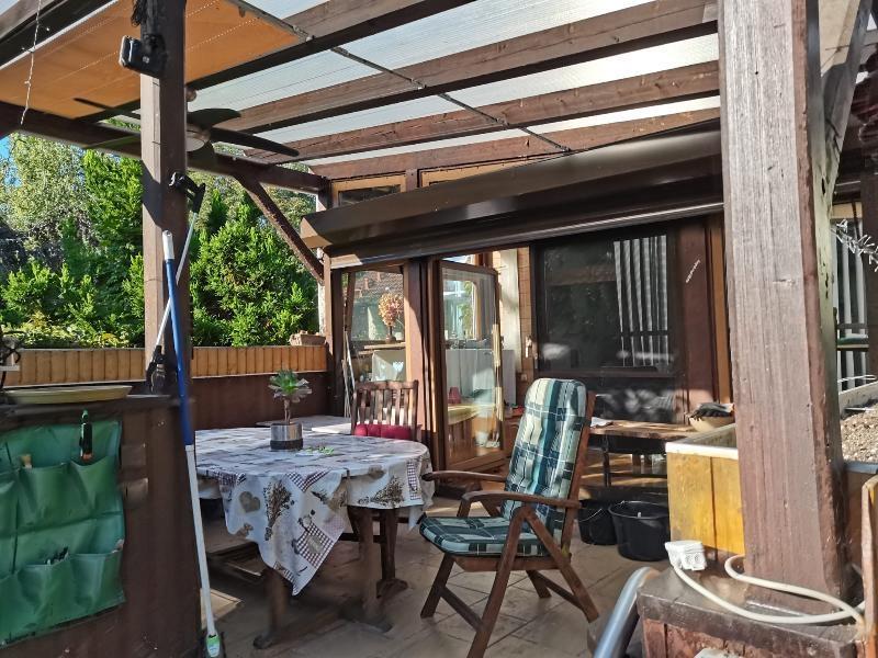 Terrasse mit Wintergarten