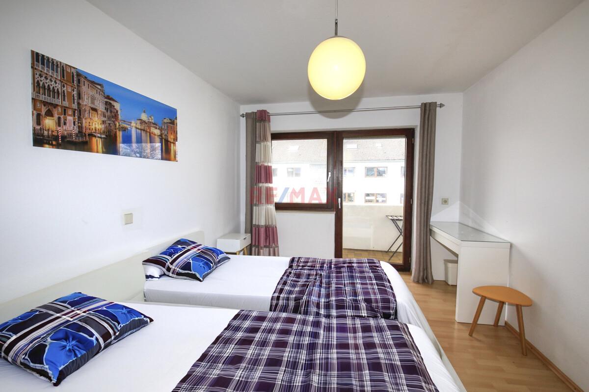 Schlafzimmer mit Balkon