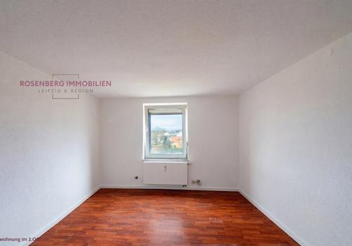 bacd933d-wohnzimmer-mehrfamilienhaus-in-muegeln-crellenhain.jpg