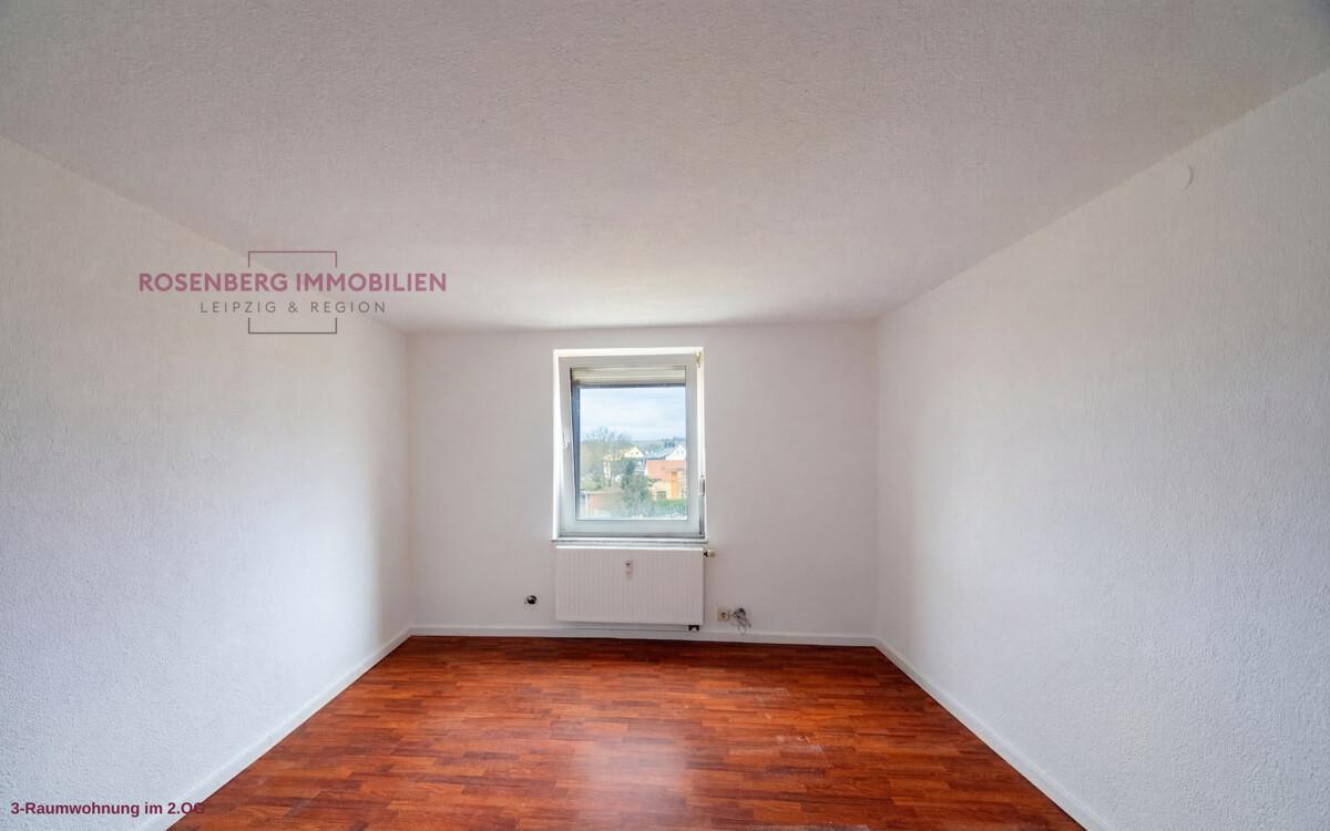 bacd933d-wohnzimmer-mehrfamilienhaus-in-muegeln-crellenhain.jpg
