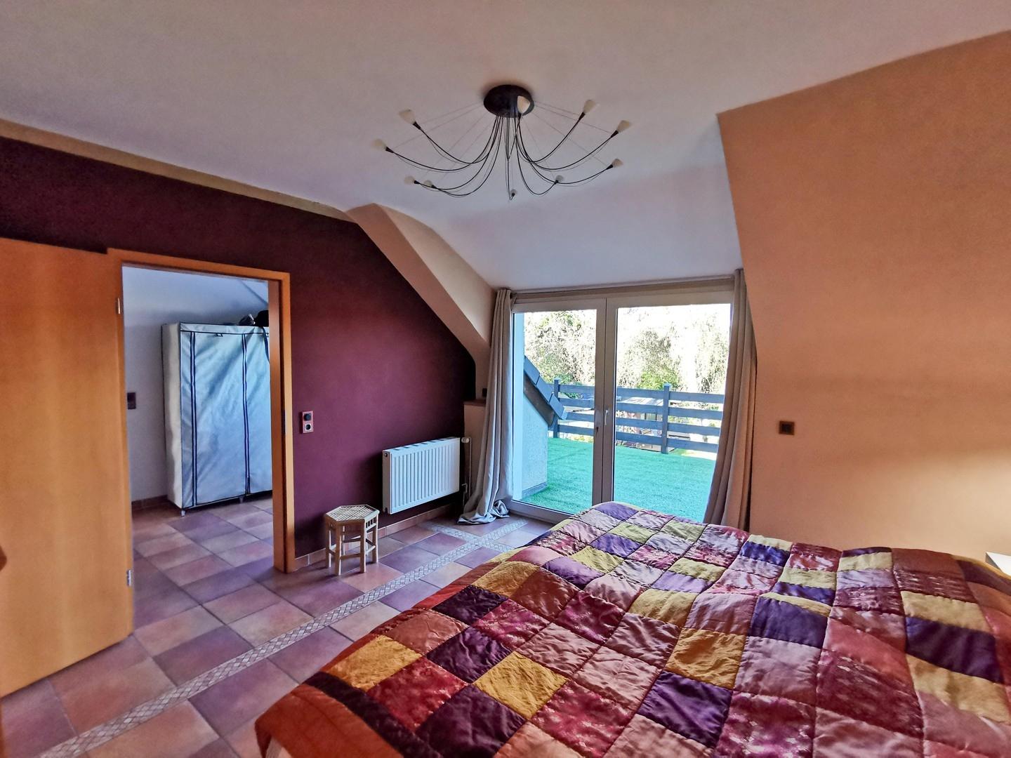 Schlafzimmer mit Dachterrasse