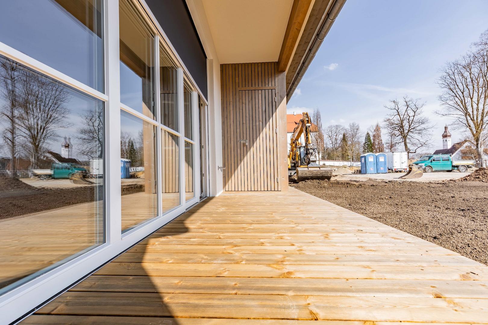 Wohnen/Essen/Kochen (EG) auf der überdachten Südterrasse