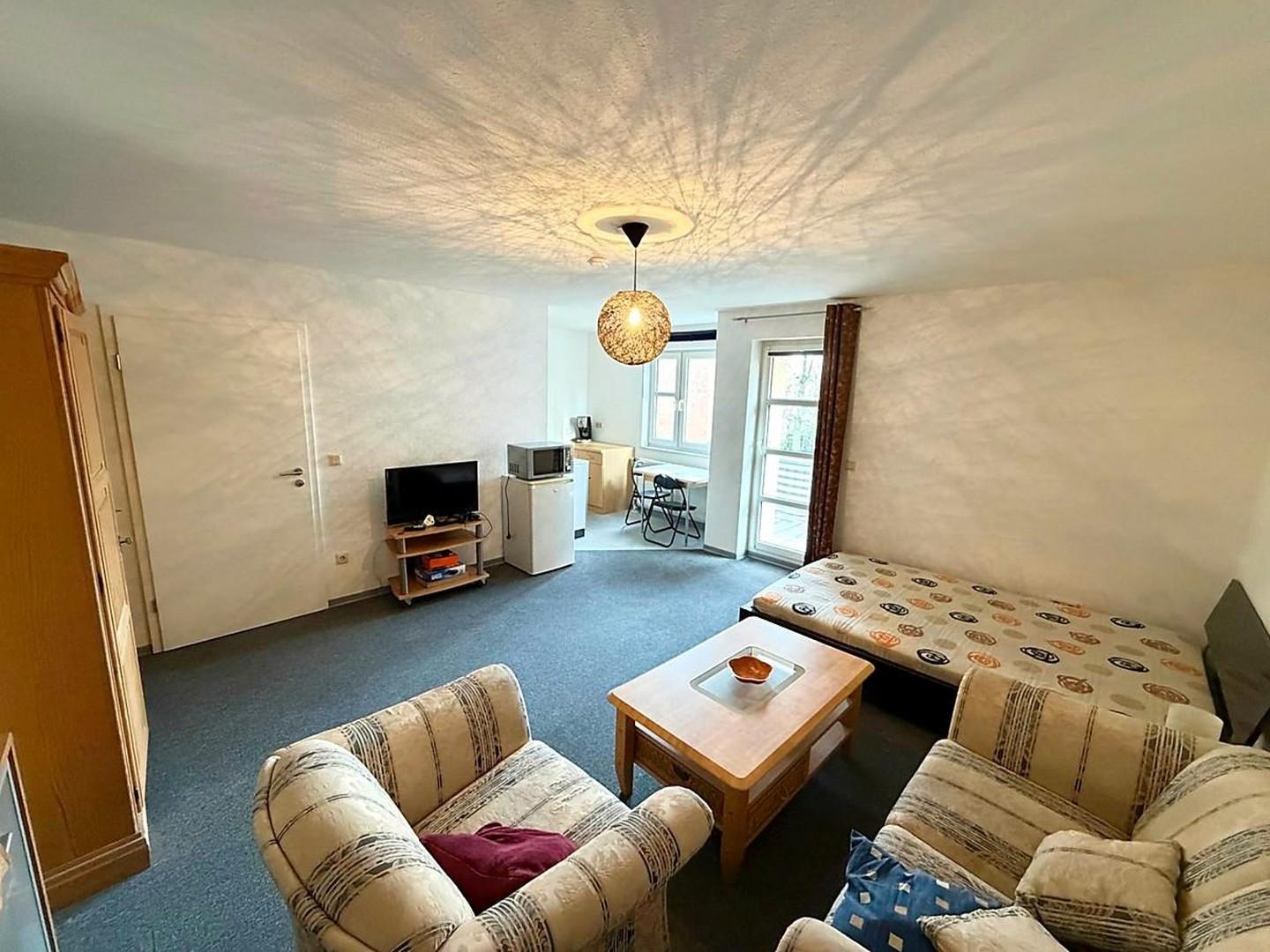 Wohnzimmer mit Blick zur Küche