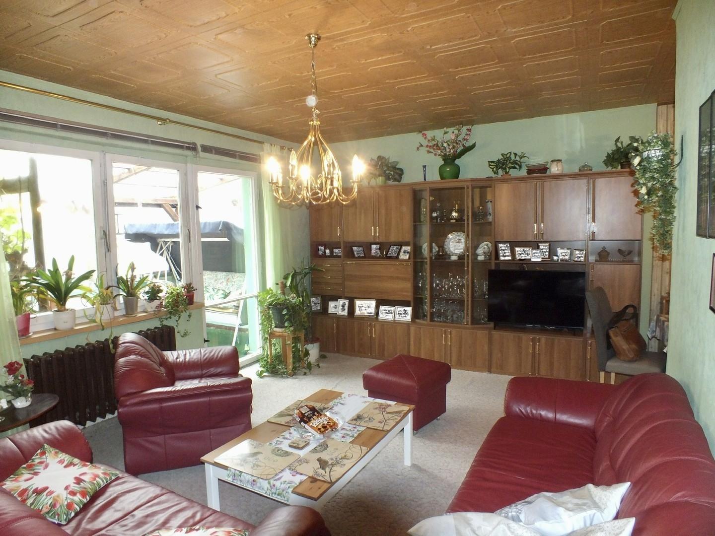 Wohnzimmer mit Balkon