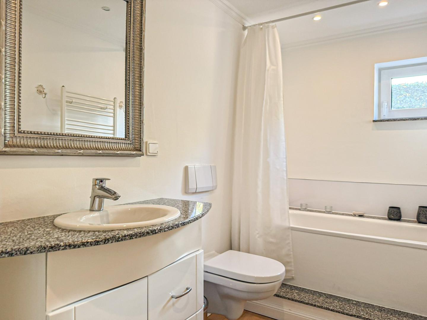 Wannenbad en suite Einlieger