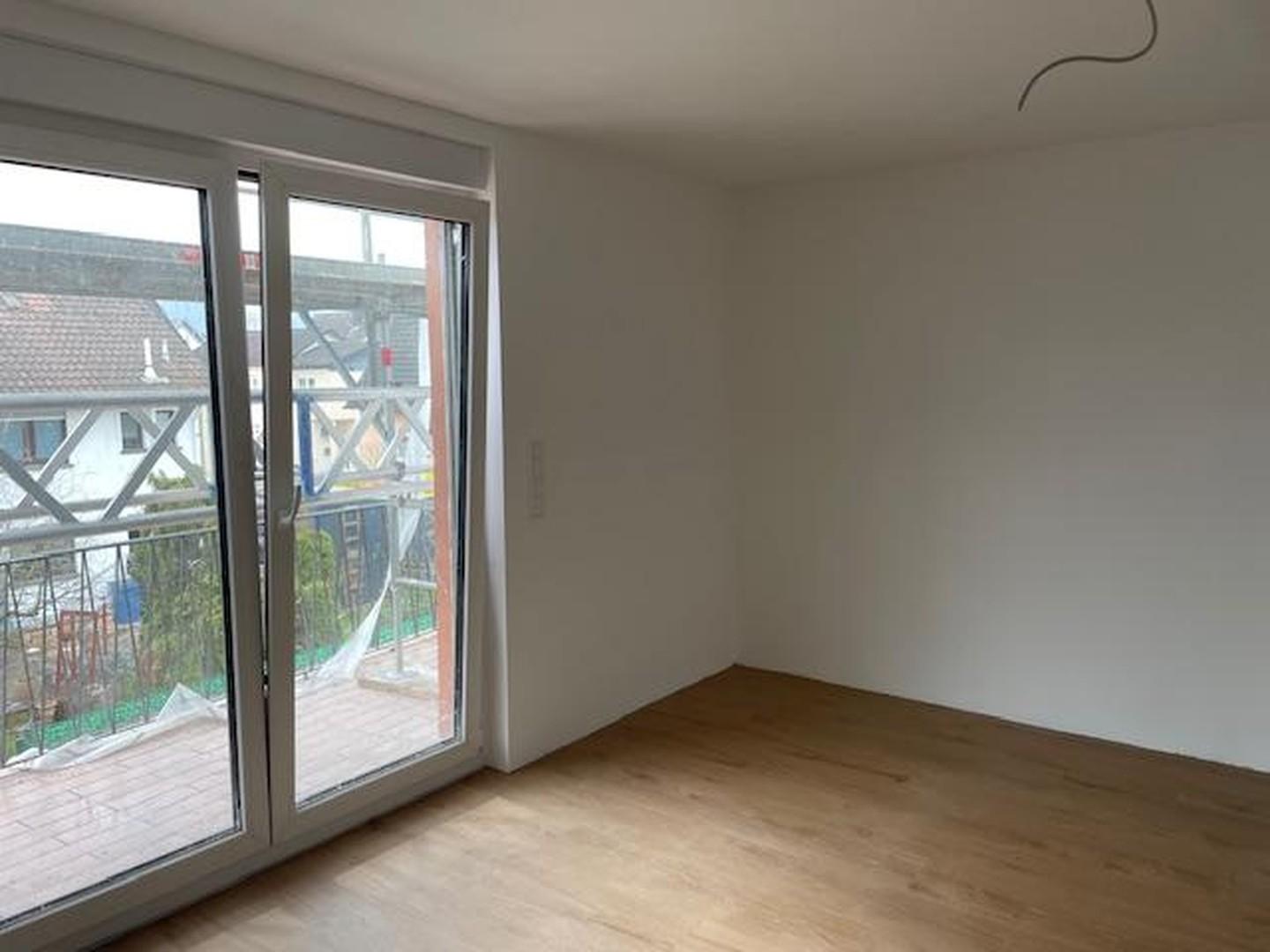 Wohnzimmer mit Südbalkon