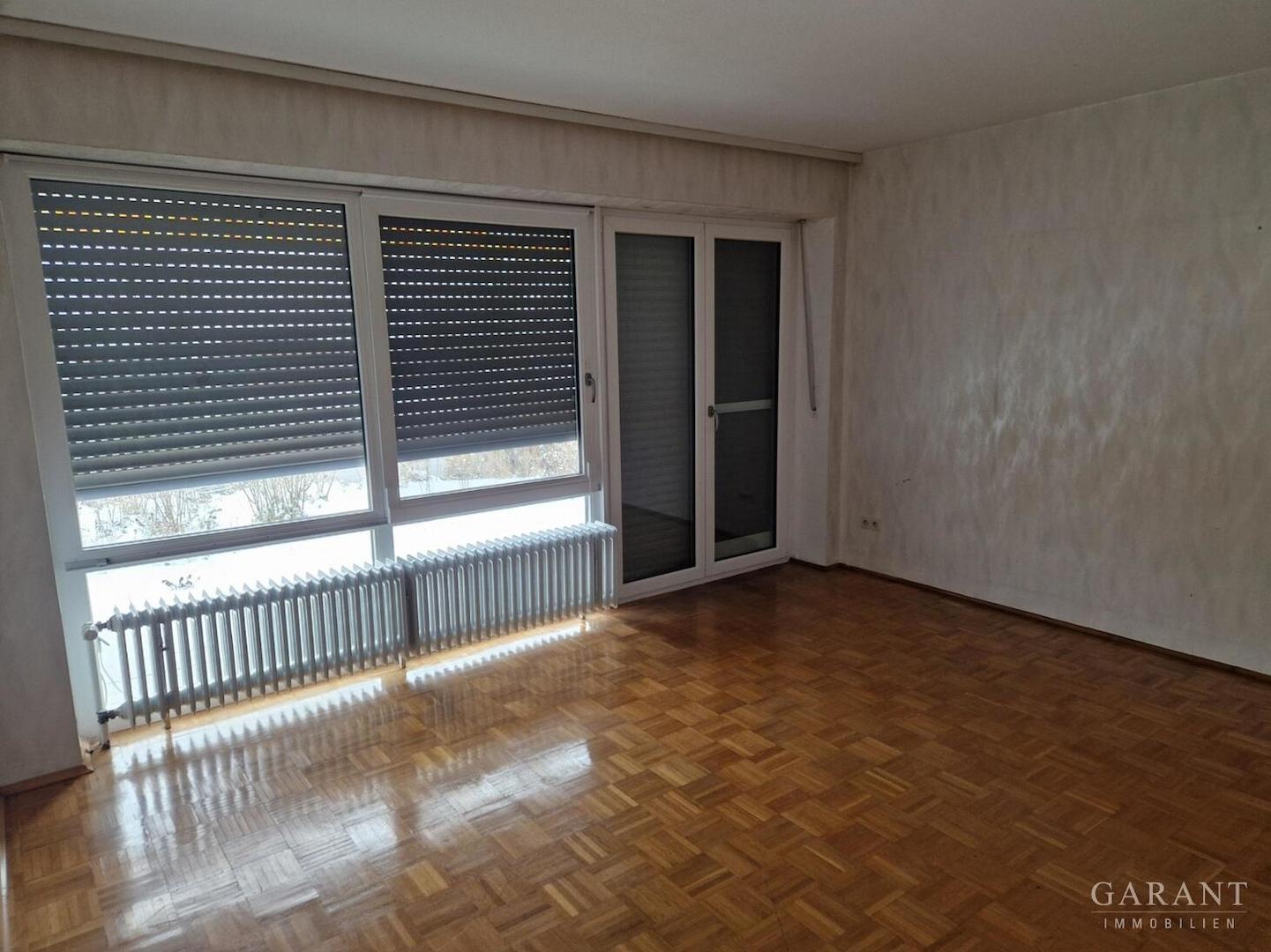 Wohnzimmer ELW mit Zugang zur Terrasse