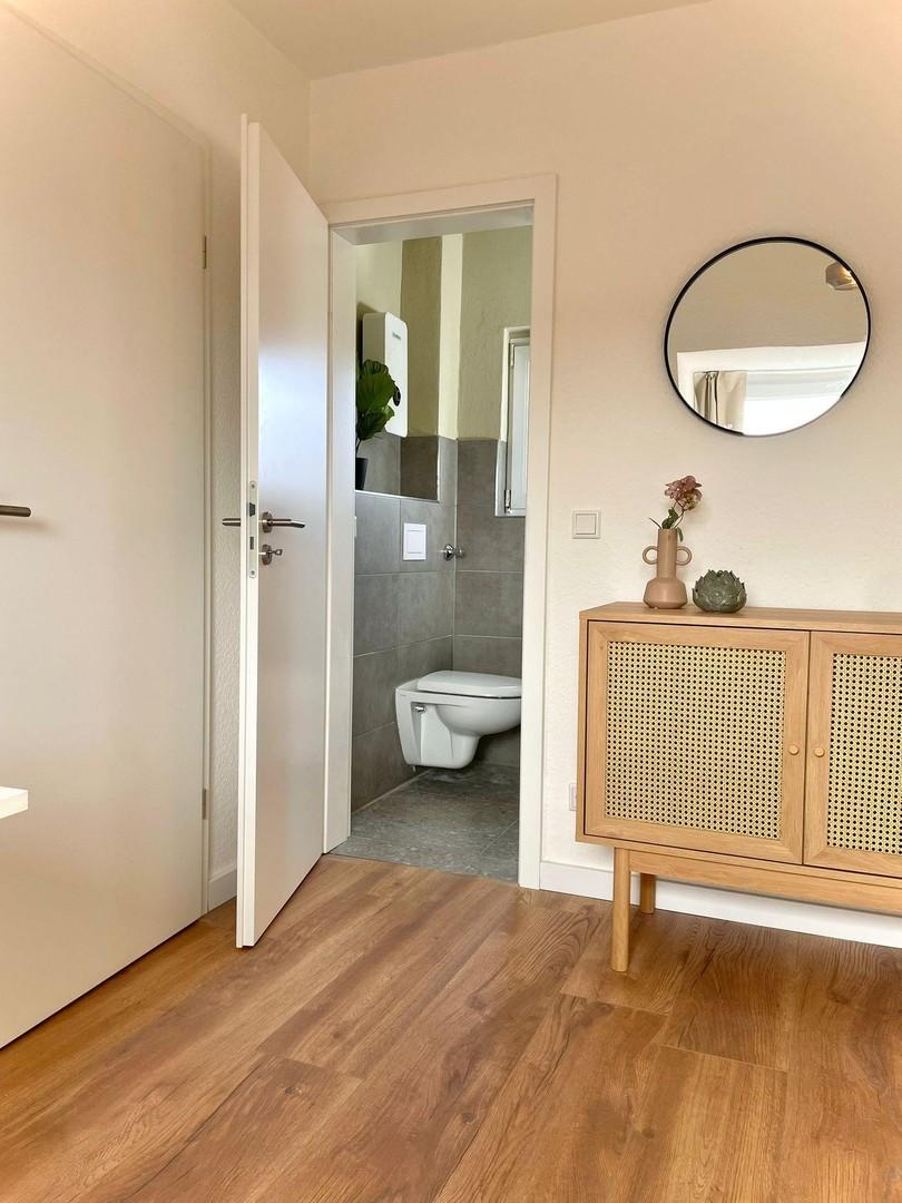 Der Zugang zum privaten Bad