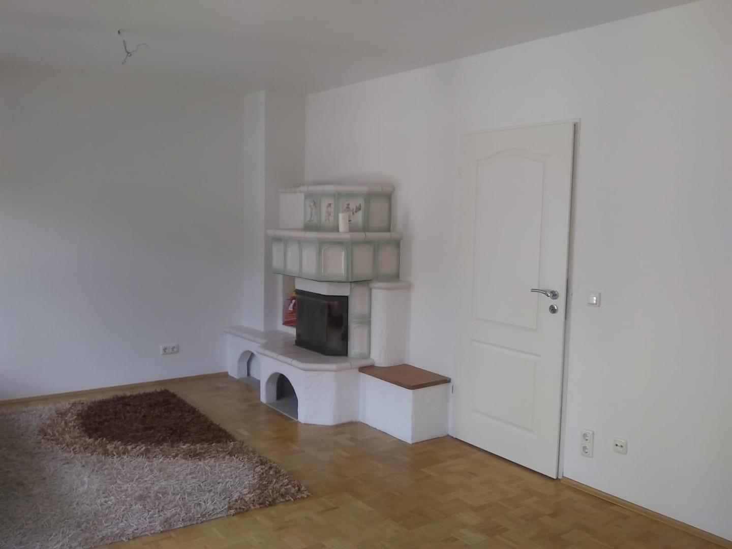 Wohnzimmer mit Kamin