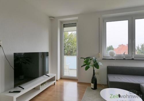 XL-TV und Balkonausgang