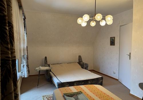 Schlafzimmer mit Balkon