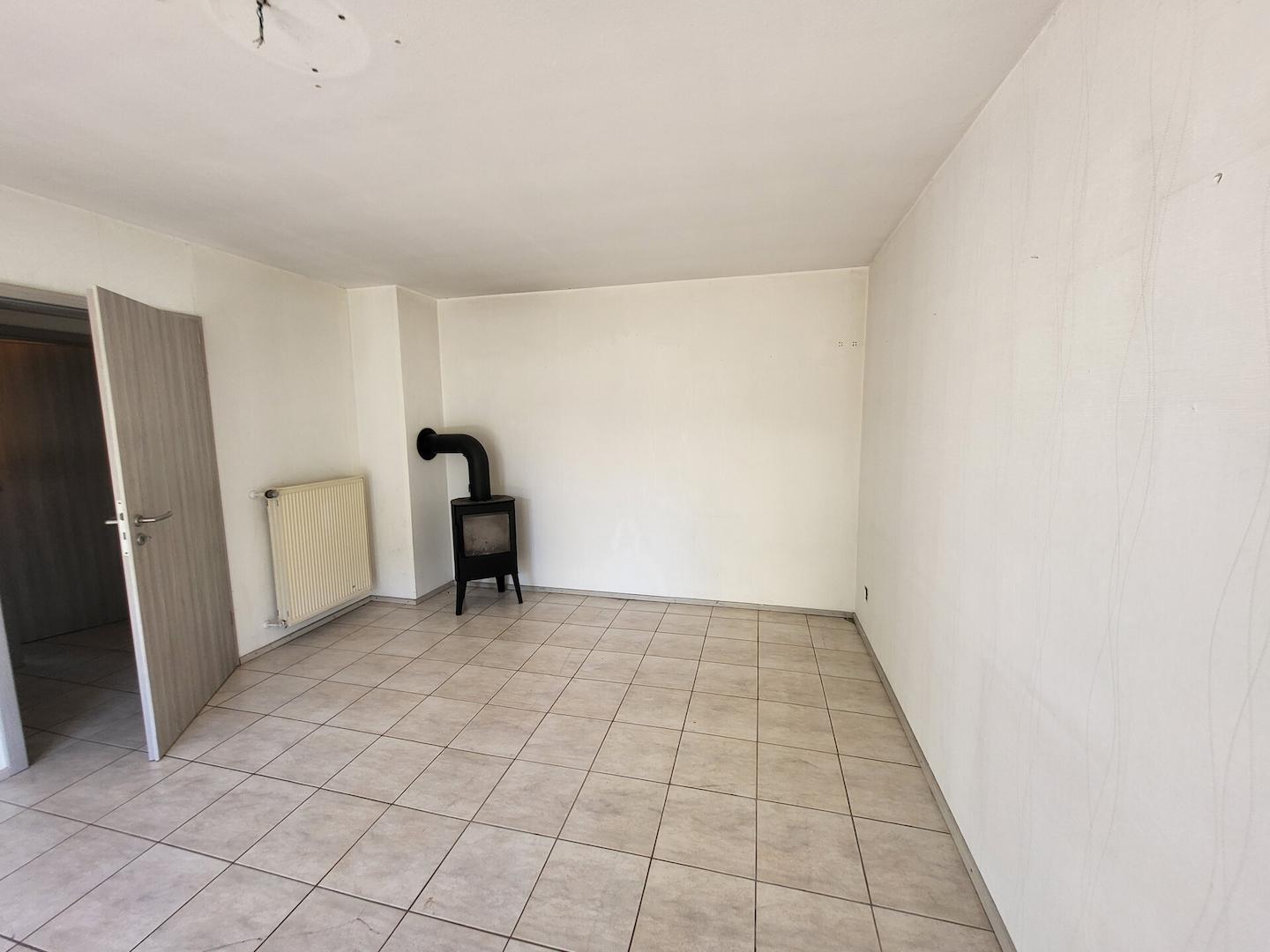 Wohnzimmer mit Kamin EG