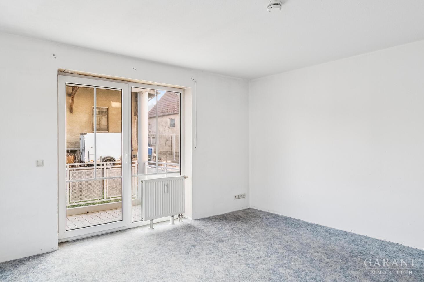 Wohnzimmer mit Balkon