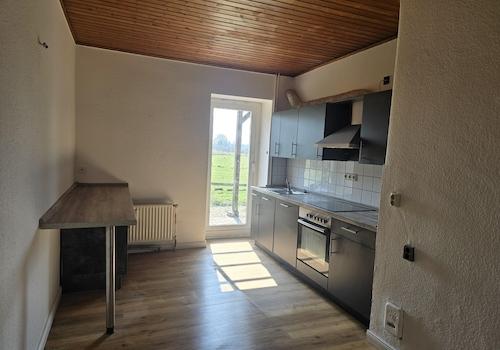 Küche mit Terrassenzugang