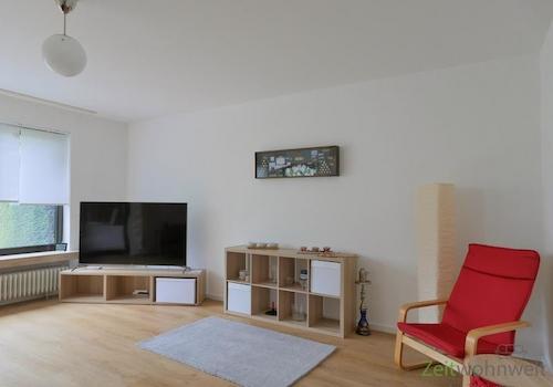 Blick zu TV, Sideboard uns Sessel
