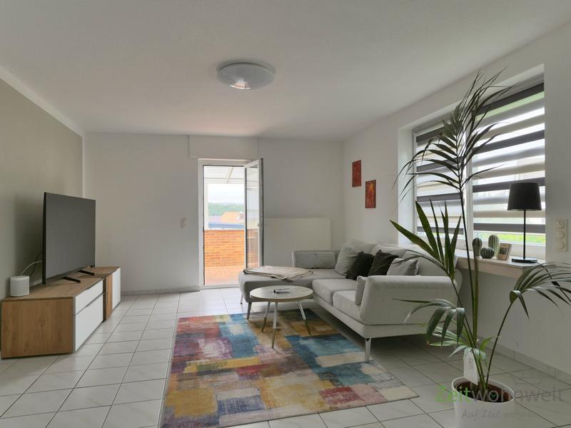 Blick zu TV und Terrasse