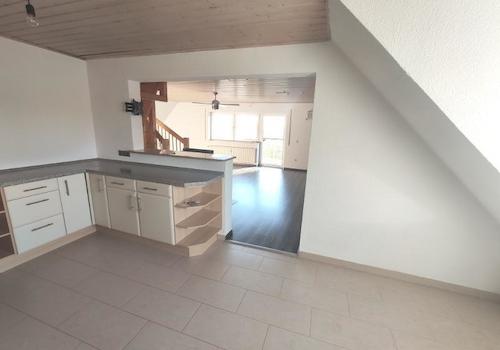 Whg. 1: Offene Küche mit Essbereich und Wohnzimmer Bild 2