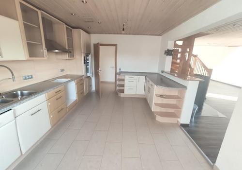 Whg. 1: Offene Küche mit Essbereich und Wohnzimmer Bild 4