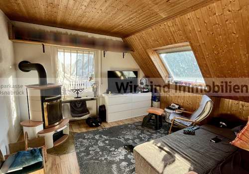 Wohnzimmer mit Ofen DG