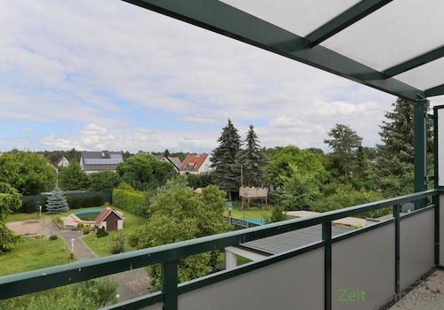 überdachter Balkon zum Garten
