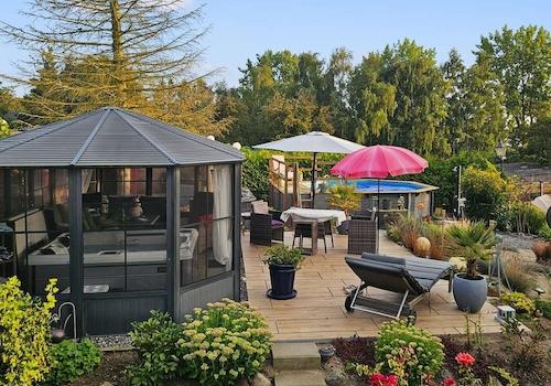 Terrasse mit Wintergarten & Whirlpool