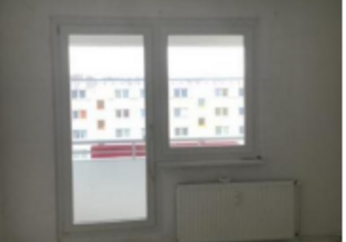 Wohnzimmer mit Balkon