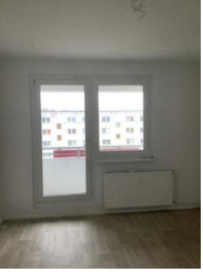 Wohnzimmer mit Balkon