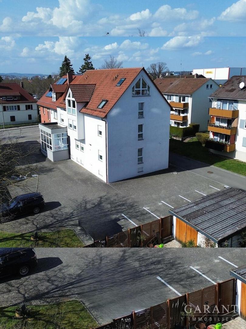 Ansicht Hotel mit Parkplatz