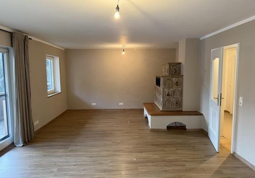 Wohnzimmer mit Kachelofen