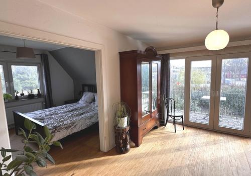 Schlafzimmer mit Balkon