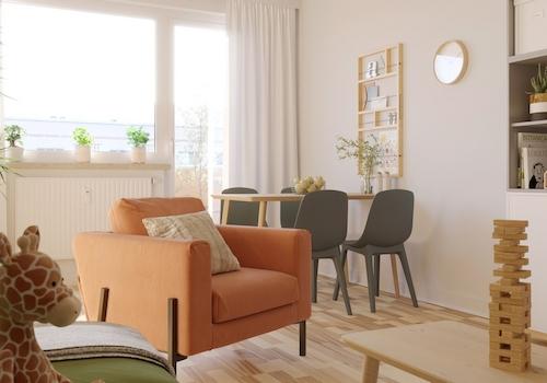 Musterbild zeigt einen Ausschnitt eines modern eingerichteten Wohnzimmers mit Balkon