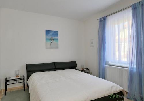 Doppelbett im Schlafzimmer