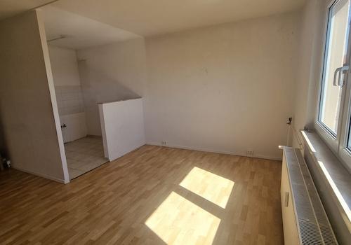 Wohnzimmer mit Küche