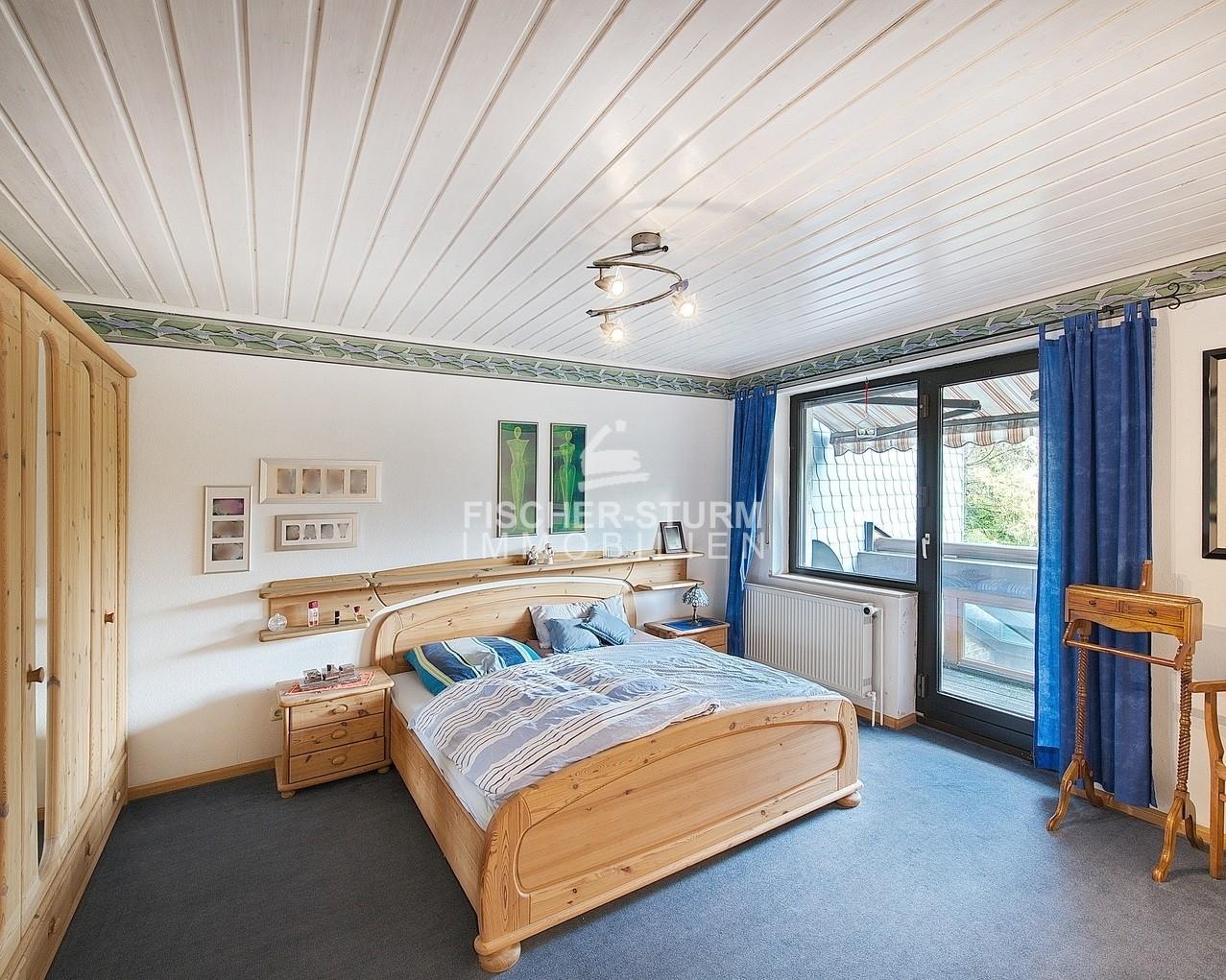 Schlafzimmer mit Balkon