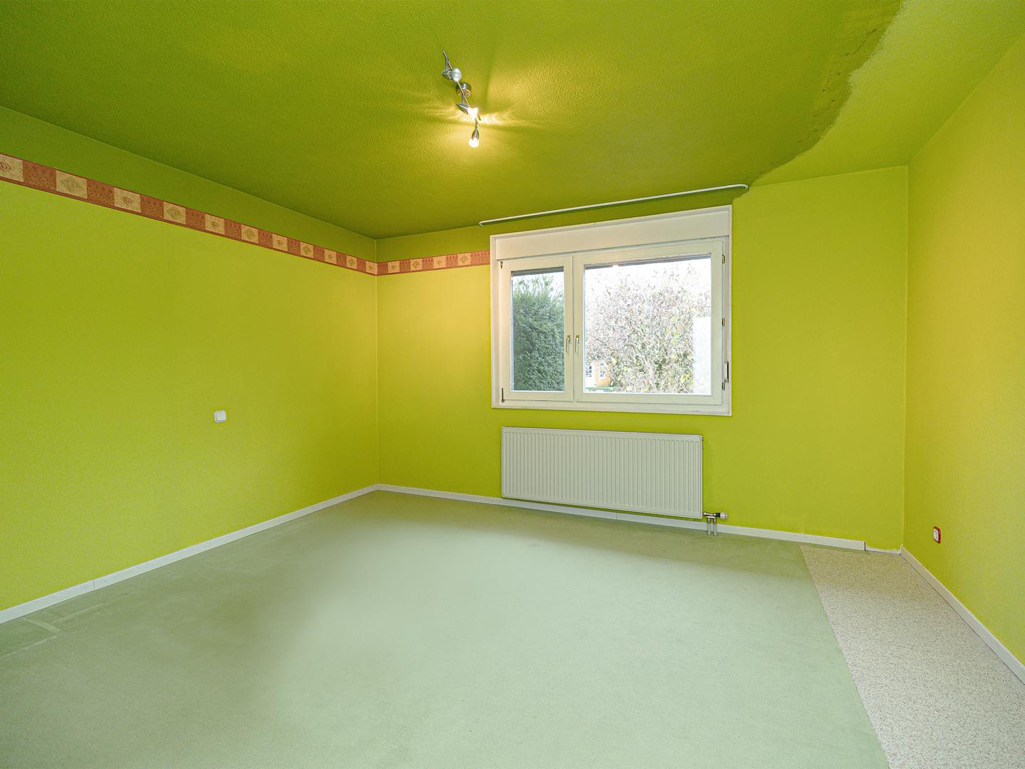 Schlafzimmer mit Blick zun Garten