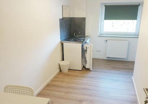 Zimmer 6   1.OG mit Miniküche