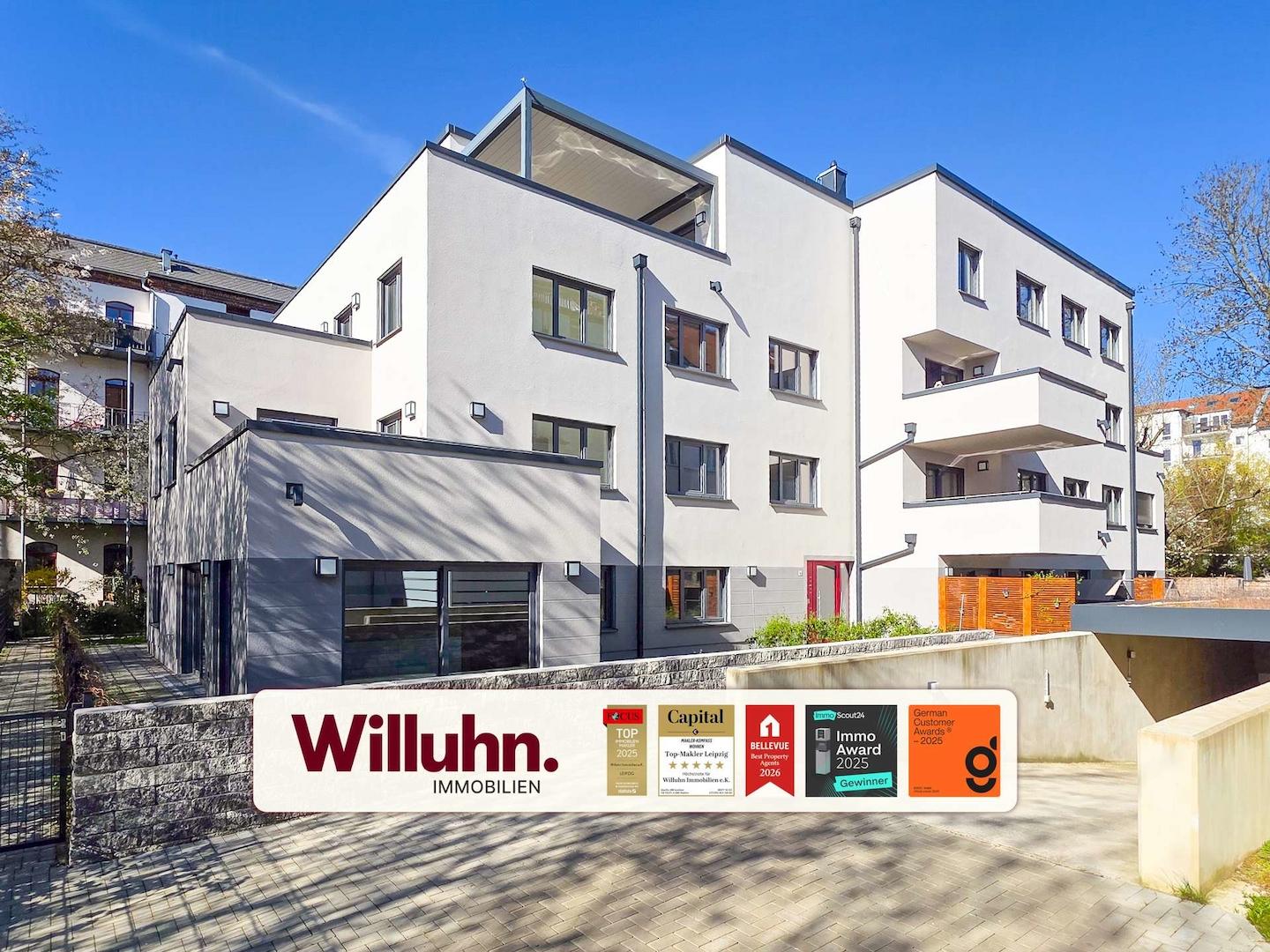 Neubau mit Tiefgarageneinfahrt