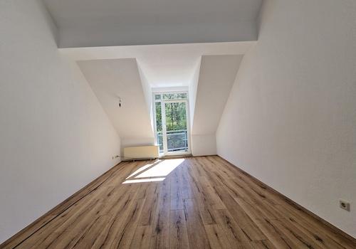 Wohnzimmer mit Balkon