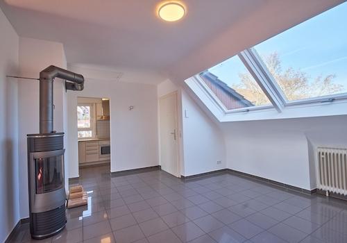 Eingangsbereich mit Ofen