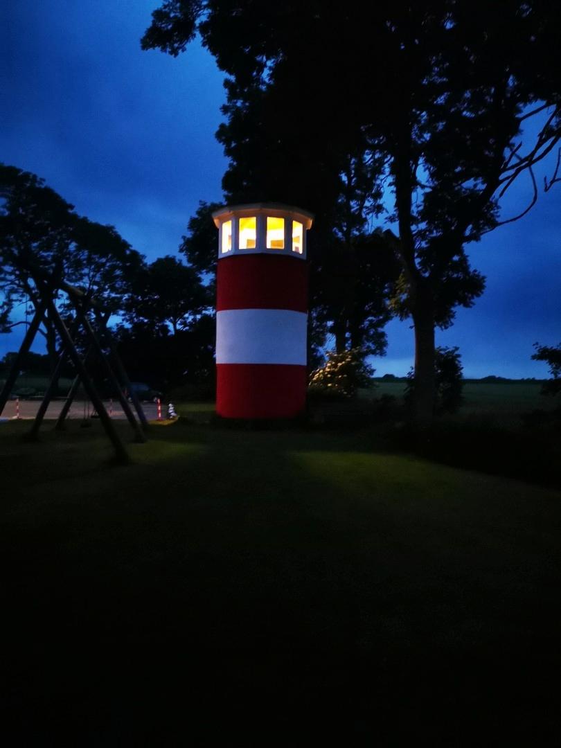 Leuchtturm bei Nacht
