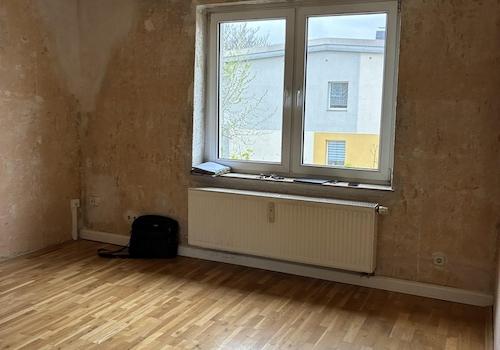 Wohnzimmer mit Echtholzparkett