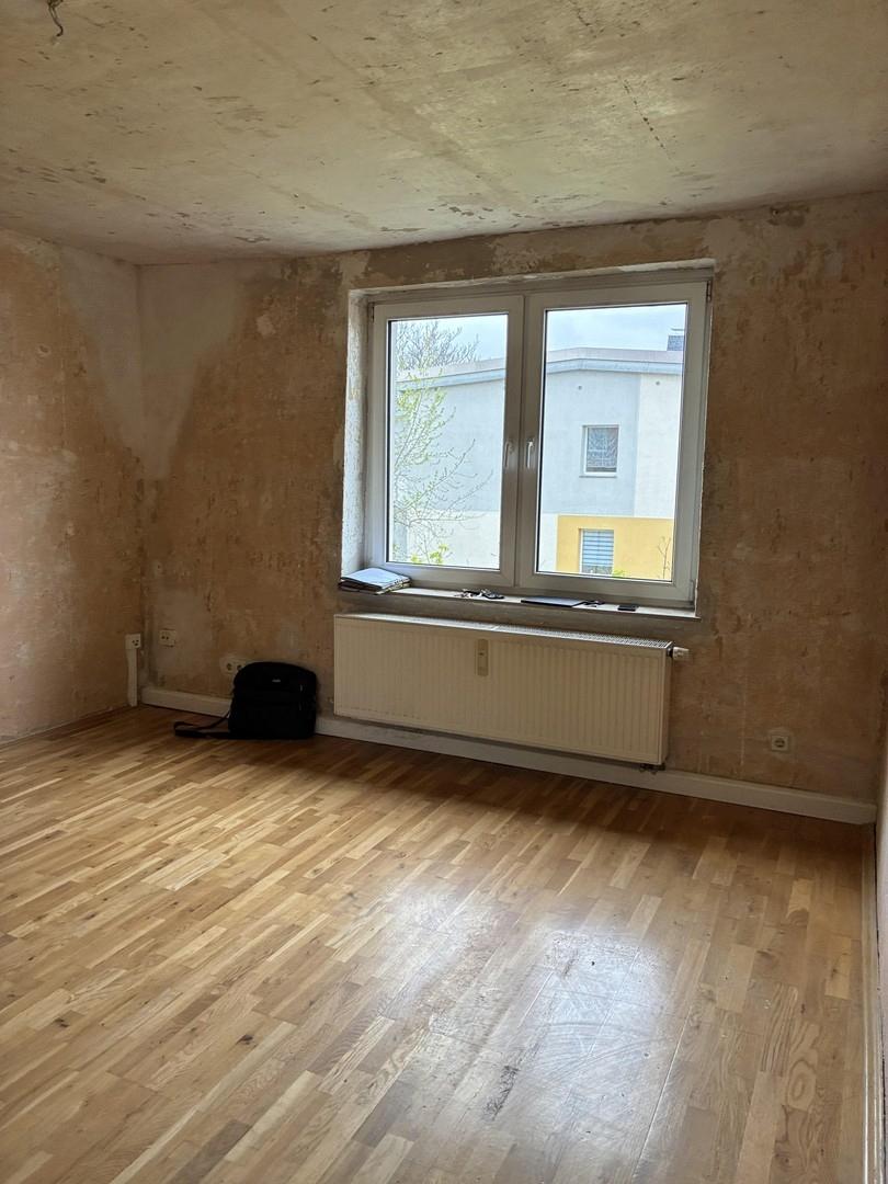 Wohnzimmer mit Echtholzparkett